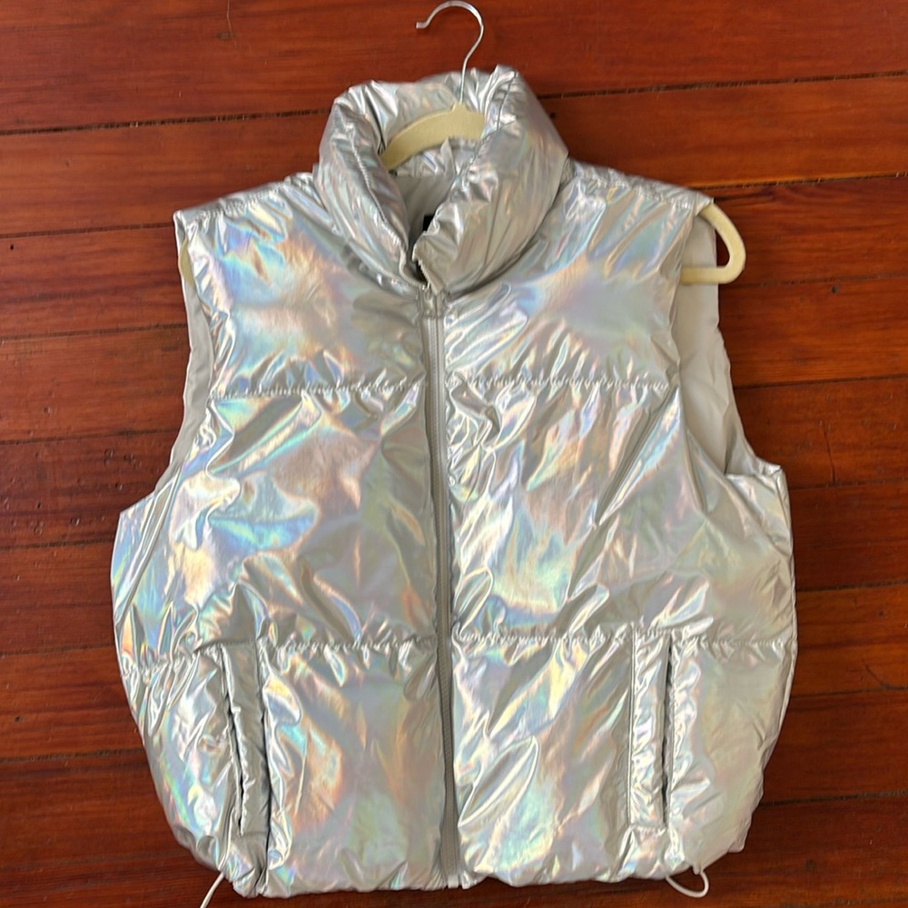 Love Streak Vest - size says large but I’m a medium in women’s and fit snug.